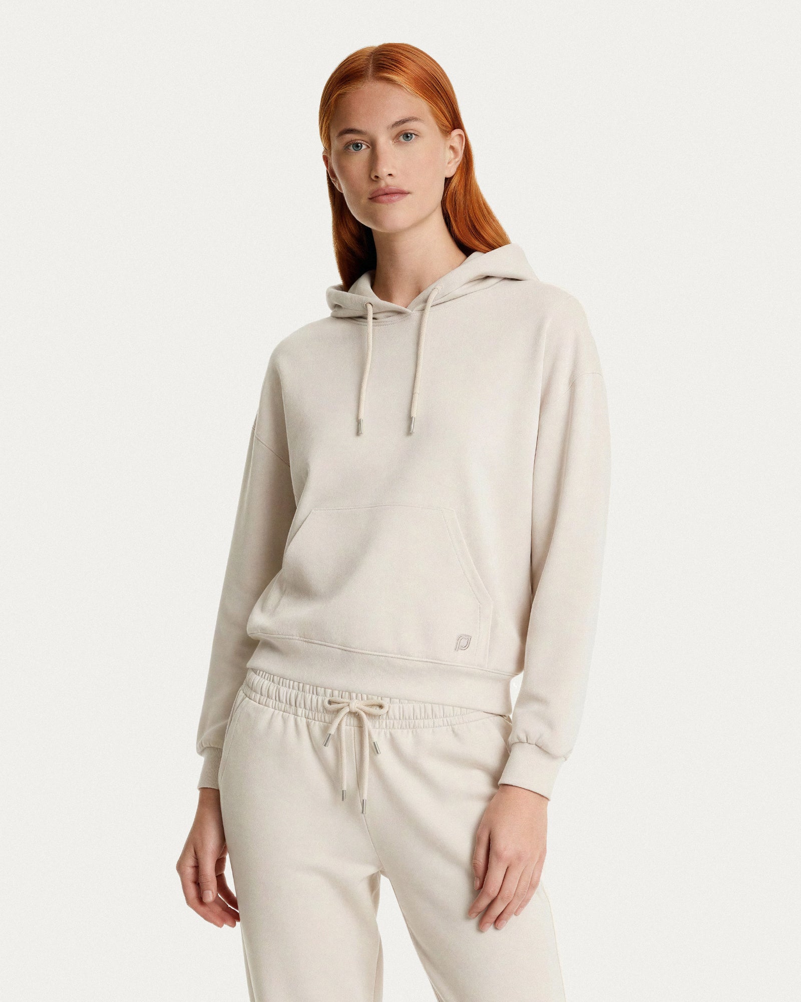 Felpa beige con cappuccio e tasca a marsupio