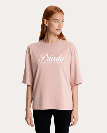 T-shirt rosa con logo e maniche scese